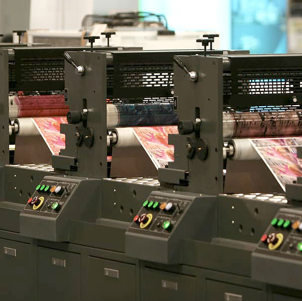 Image of a printing machine in the middle of printing.